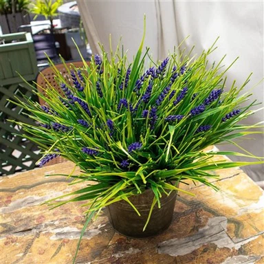 Simulation de roseau en pot avec fleur violette et feuilles vertes pour décoration intérieure et extérieure